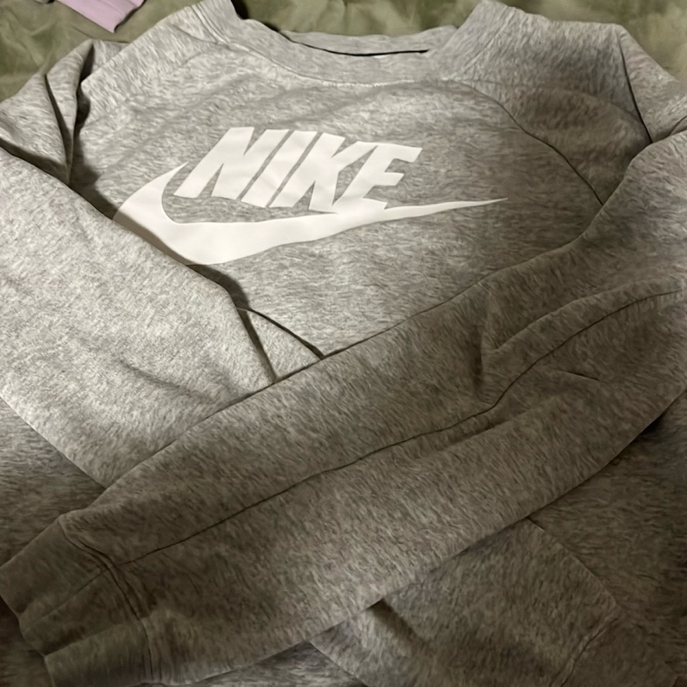 Grey Nike sweatshirt
